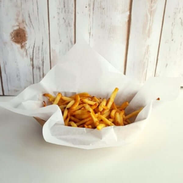 Hartie cerata Kebap 35x50cm with crispy fries in a basket, perfect for fast food packaging.